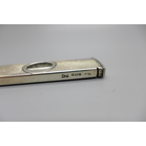 867 - A silver cigar cutter