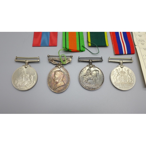 873 - A WWI British War medal to 82039 Gnr. S. Soper R.A., a George VI Territorial medal to 2083588 Cpl. S... 