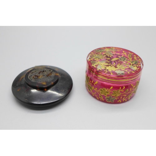 874 - A cranberry glass pot and a tortoiseshell compact decorated with an oriental dragon, a/f