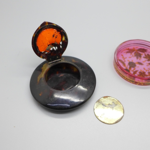 874 - A cranberry glass pot and a tortoiseshell compact decorated with an oriental dragon, a/f