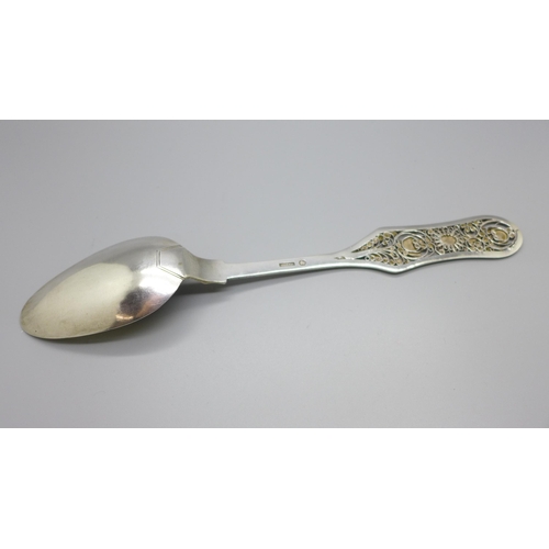 883 - A continental white metal spoon with pierced/filigree handle and gilt inner bowl, marked 'Sucker', 6... 