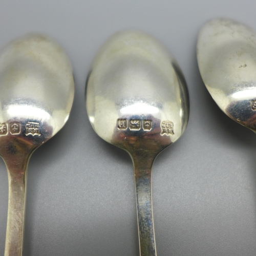 884 - A set of five silver spoons, 55g