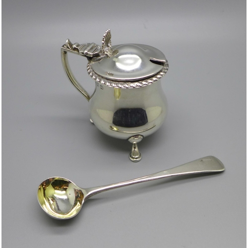 885 - A Victorian silver mustard, Birmingham 1876, and a Georgian silver mustard spoon, 78g