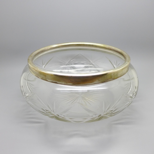 893 - A large silver rimmed glass fruit bowl, hallmarked London 1925, D & Co. Ltd.