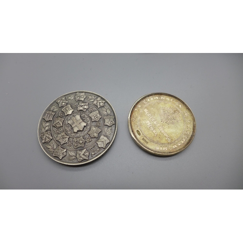 894 - Two silver medallions, 128g