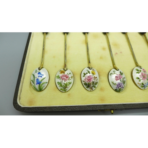 897 - A set of six silver and enamel spoons, Birmingham 1941, one with shallow chip to the enamel, associa... 