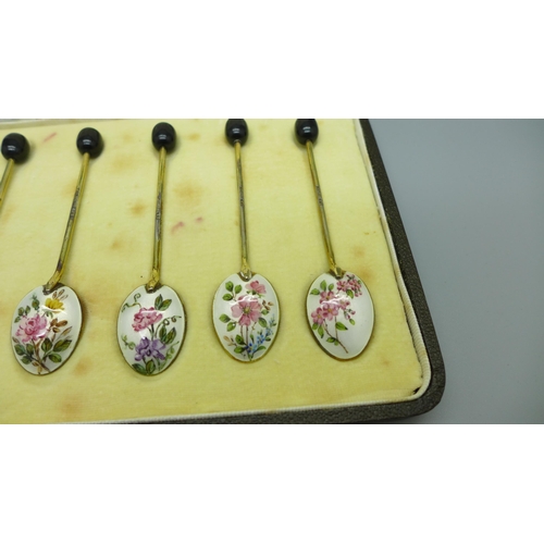 897 - A set of six silver and enamel spoons, Birmingham 1941, one with shallow chip to the enamel, associa... 