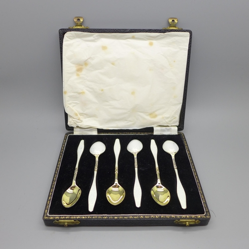 898 - A cased set of six silver and enamel spoons, one with shallow chip to the enamel