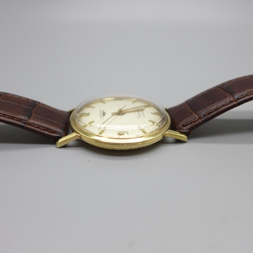 899 - A 9ct gold cased Longines Flaship automatic wristwatch, with later Longines box, 34mm case