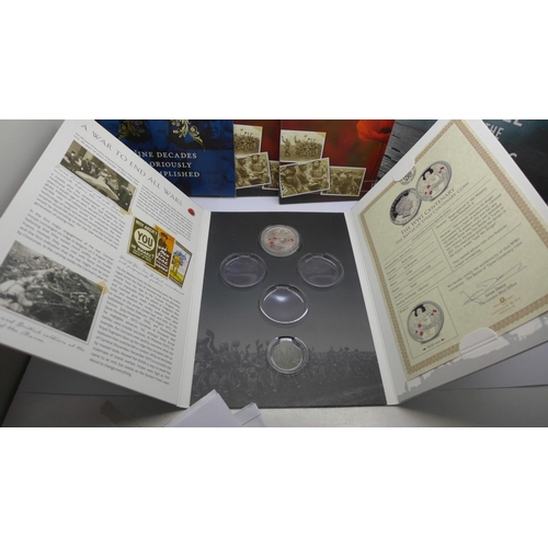 901 - A collection of commemorative coins including one silver 1973 Royal wedding coins, (folders not comp... 