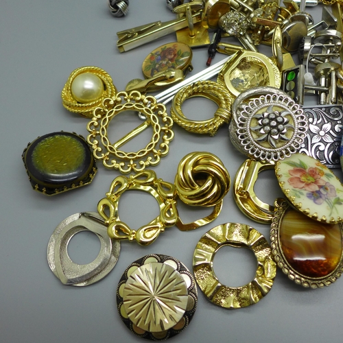 902 - Twenty-five pairs of clip on earrings, cufflinks, tie pins and scarf clips