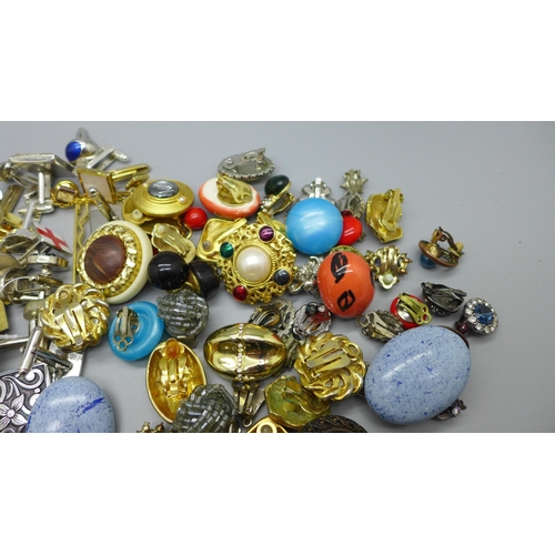 902 - Twenty-five pairs of clip on earrings, cufflinks, tie pins and scarf clips