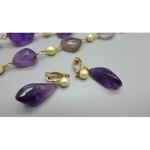 907 - An amethyst and cultured Ciro pearl necklace and a pair of similar clip-on earrings