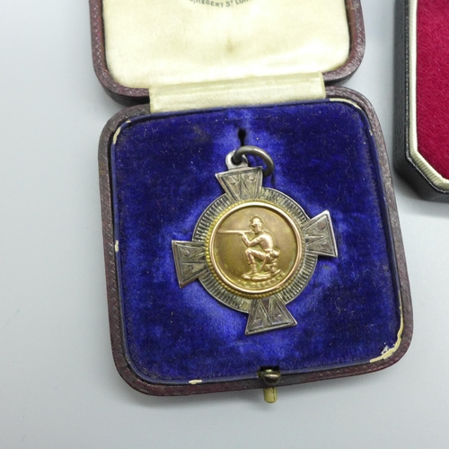 908 - An Imperial Service medal to William Robert Jenkinson, cased, a silver and applied gold shooting fob... 