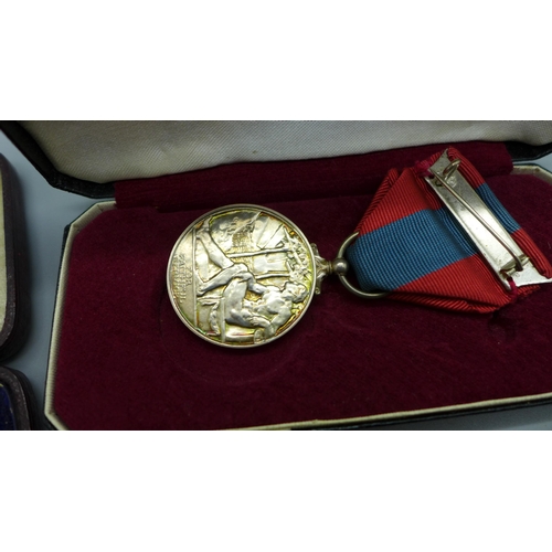 908 - An Imperial Service medal to William Robert Jenkinson, cased, a silver and applied gold shooting fob... 