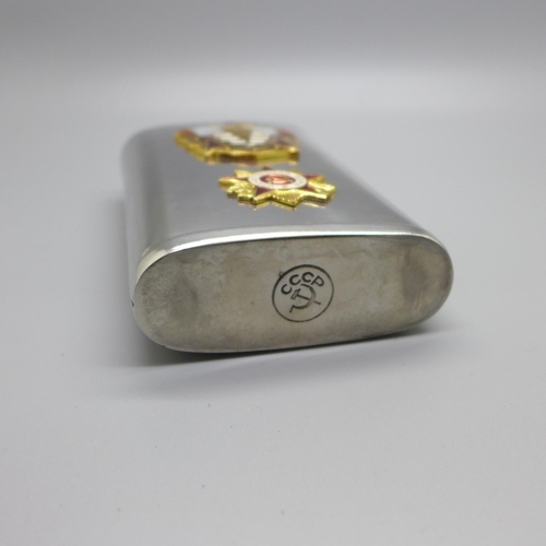 912 - A vintage Soviet spirit flask mounted with two enamel badges