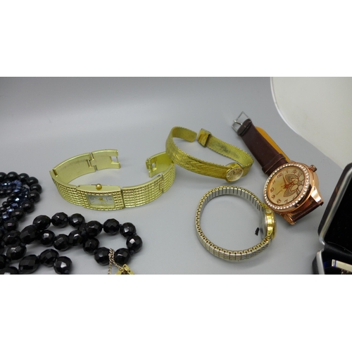 934 - Wristwatches, cufflinks, a bangle and a beaded necklace