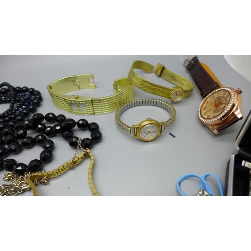 934 - Wristwatches, cufflinks, a bangle and a beaded necklace