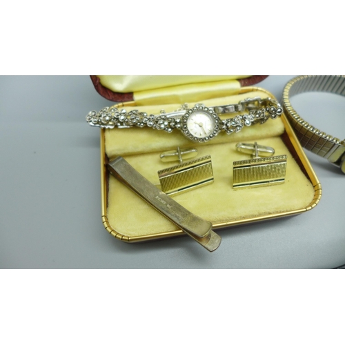 935 - A collection of jewellery and wristwatches, including silver cufflinks, a silver tie-pin and a silve... 