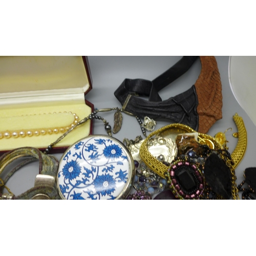 938 - Costume jewellery, a compact, buckle, etc.