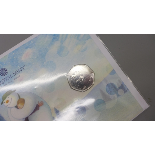 942 - The Royal Mint The Snowman 50p coin pack and a UK 2016 Beatrix Potter 50p coin collecting pack, Squi... 