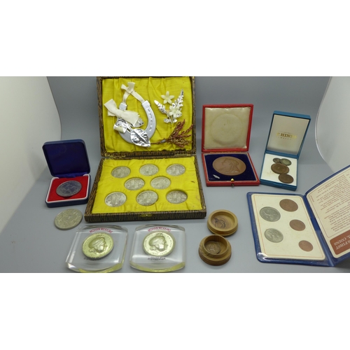 944 - A case with eight 1946 half-crowns, a Queen Victoria commemorative medallion and other coins