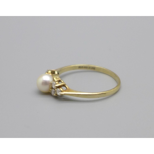 957 - A 9ct gold, cultured pearl and white stone ring, 1.7g, P