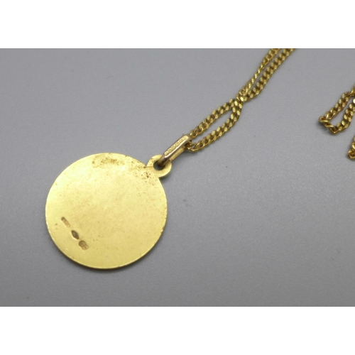 959 - A 9ct gold St. Christopher pendant on a 9ct gold chain, 6.6g