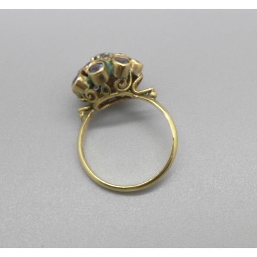 962 - An 18ct gold and blue stone cluster ring, 4.0g, M