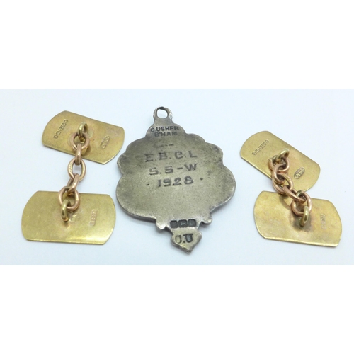 966 - A pair of 9ct gold cufflinks, 4.6g and a silver fob