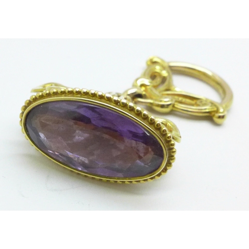 968 - A 14ct yellow gold and amethyst fob, 8.4g