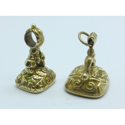 977 - A 9ct gold seal fob and a yellow metal seal fob, total weight 6.2g