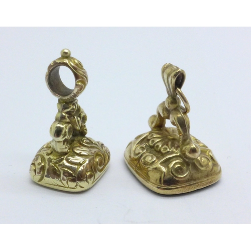 977 - A 9ct gold seal fob and a yellow metal seal fob, total weight 6.2g