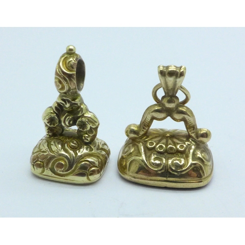 977 - A 9ct gold seal fob and a yellow metal seal fob, total weight 6.2g