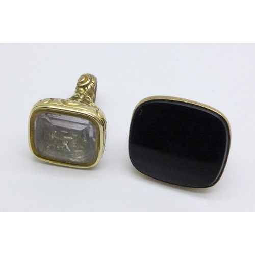 977 - A 9ct gold seal fob and a yellow metal seal fob, total weight 6.2g