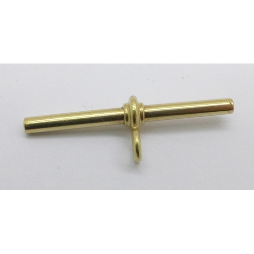 980 - A yellow metal T bar, tested for 9ct gold, 2.2g