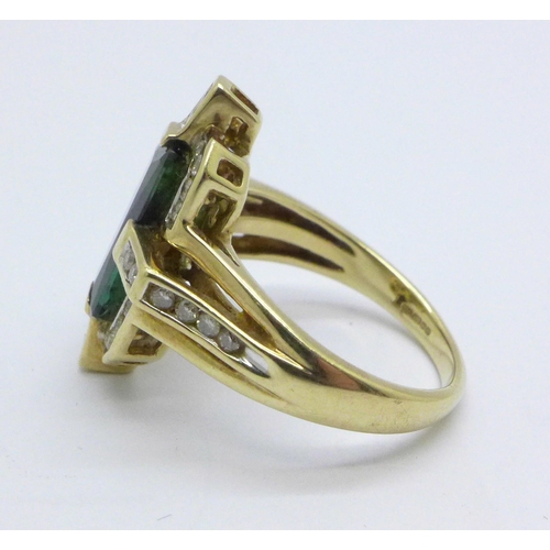 985 - A 9ct gold, diamond and tourmaline ring, 4.9g, N