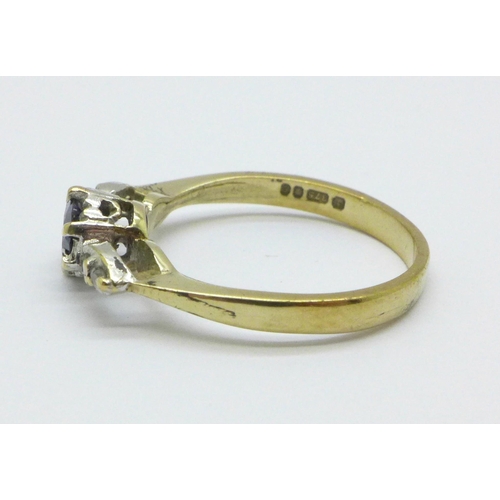 994 - A 9ct gold, sapphire and diamond ring, 2.3g, N