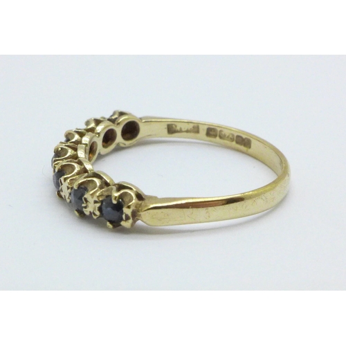 996 - A 9ct gold, seven stone sapphire ring, 1.8g, O