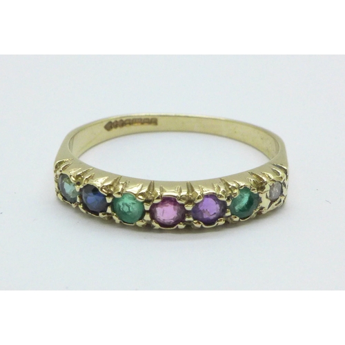 998 - A 9ct gold seven stone ring set with diamond, emerald, sapphire, blue zircon, etc. 1.9g, P