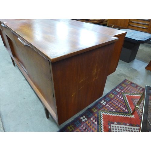 105 - A teak sideboard