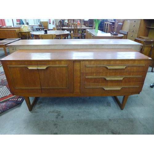 106 - A teak sideboard