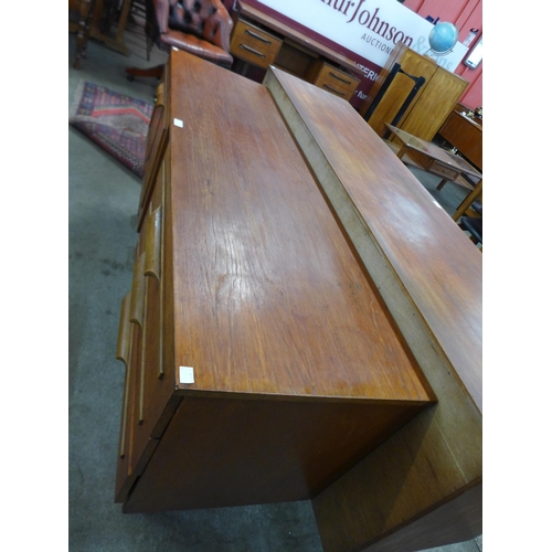 106 - A teak sideboard