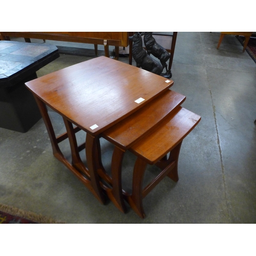 109 - A teak nest of tables