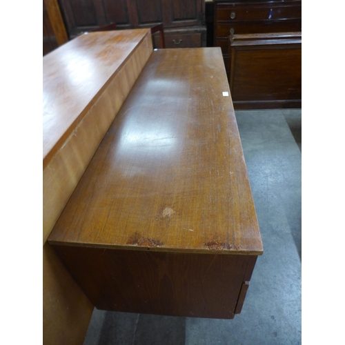 114 - A small teak sideboard