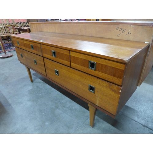 114 - A small teak sideboard