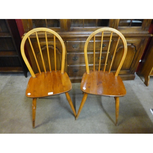 120 - A pair of Ercol Blonde elm and beech Windsor chairs