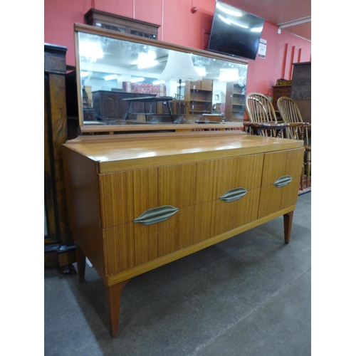 121 - A Remploy teak dressing table