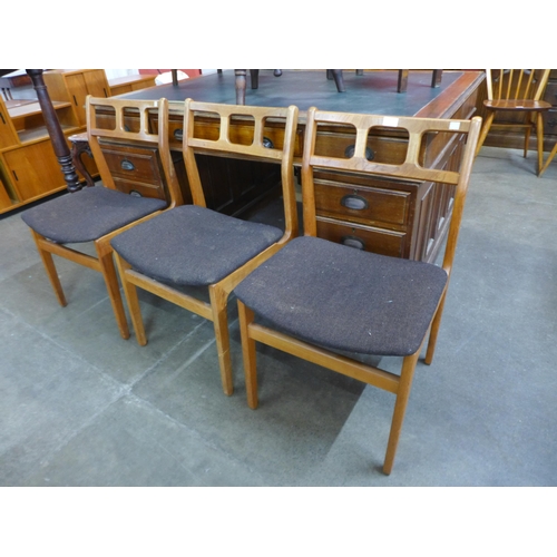 122 - A set of three Danish D-Scan teak chairs