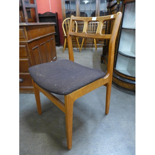 122 - A set of three Danish D-Scan teak chairs